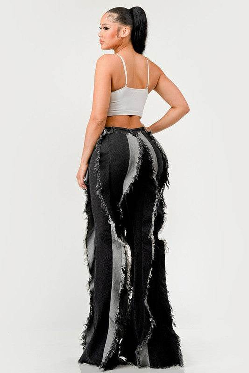 The "Deconstructed Glam" Flared Jeans
Rebel Ruffle Flare Denim