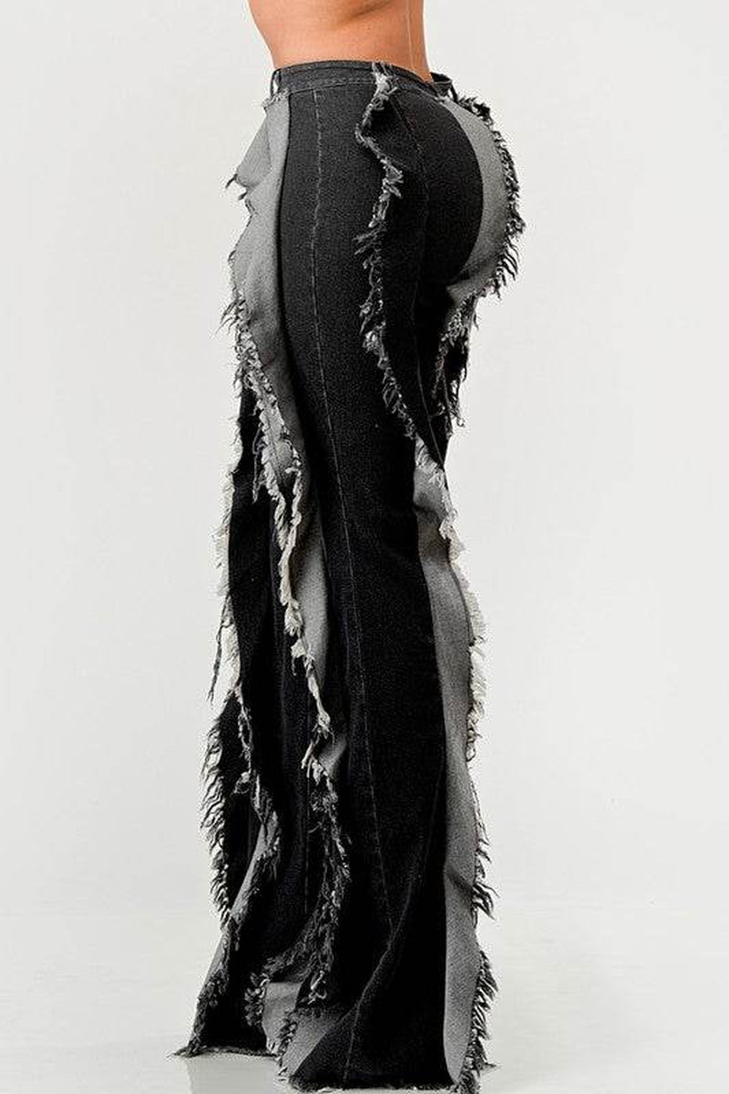 The "Deconstructed Glam" Flared Jeans
Rebel Ruffle Flare Denim