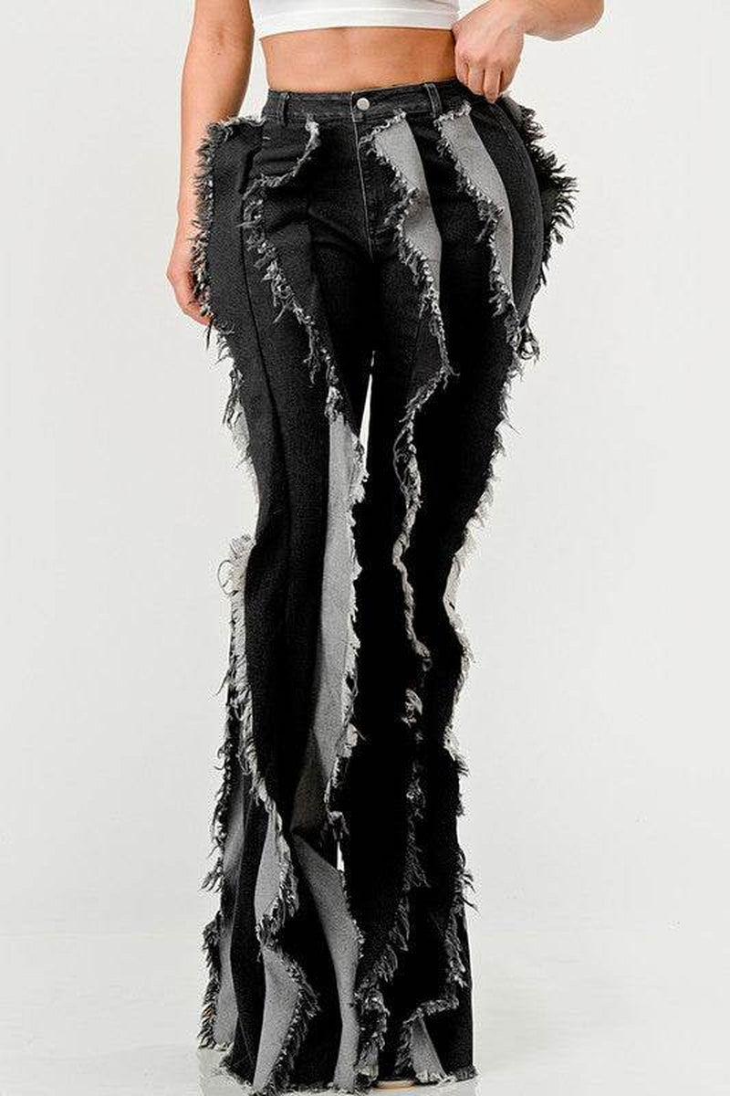 The "Deconstructed Glam" Flared Jeans
Rebel Ruffle Flare Denim