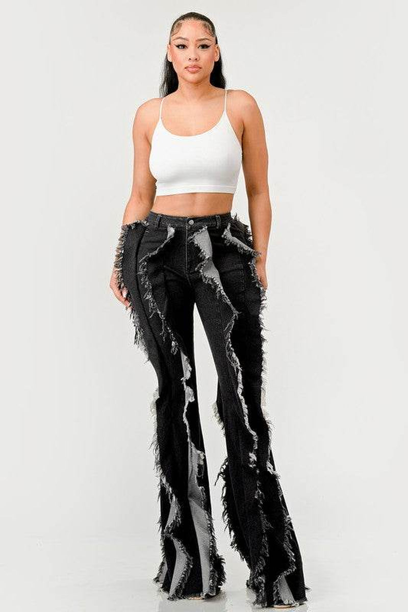 The "Deconstructed Glam" Flared Jeans
Rebel Ruffle Flare Denim