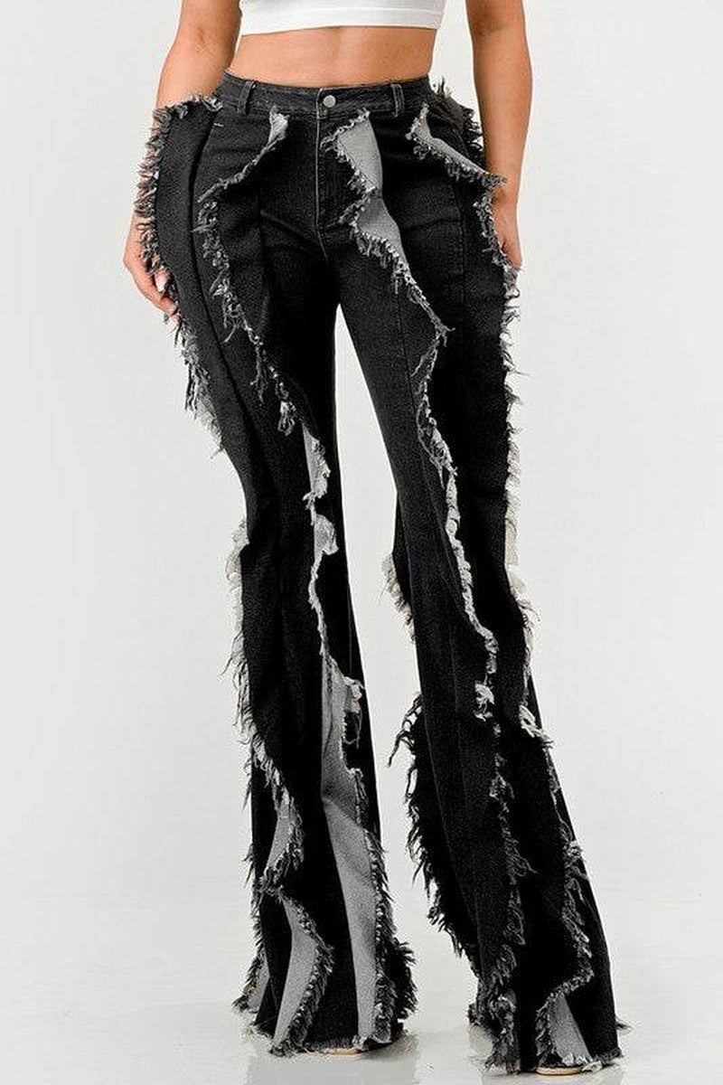 The "Deconstructed Glam" Flared Jeans
Rebel Ruffle Flare Denim