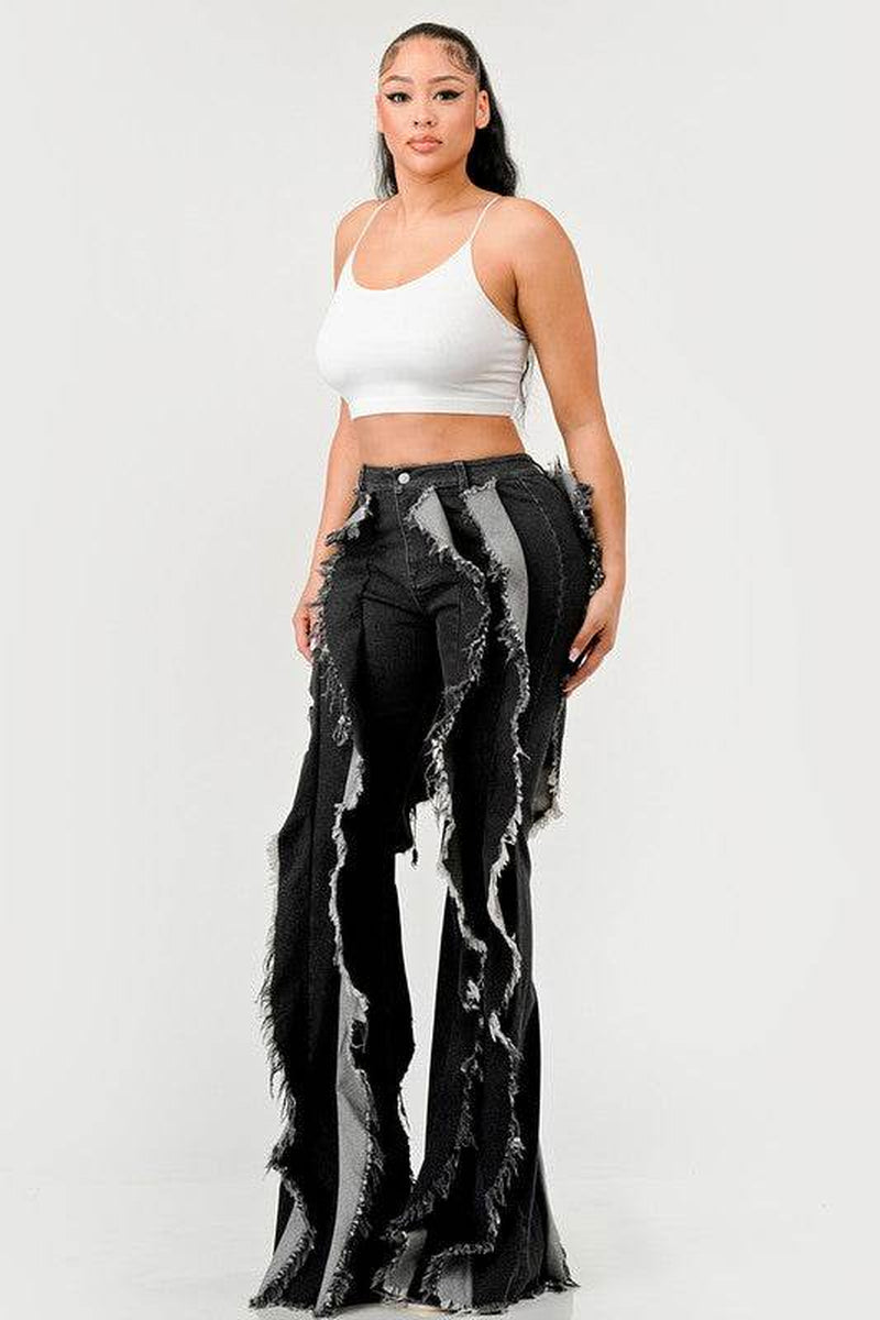 The "Deconstructed Glam" Flared Jeans
Rebel Ruffle Flare Denim