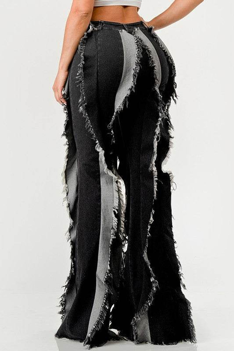 The "Deconstructed Glam" Flared Jeans
Rebel Ruffle Flare Denim