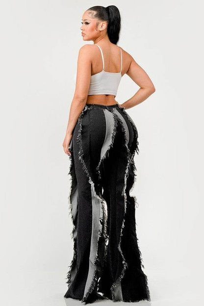 The "Deconstructed Glam" Flared Jeans
Rebel Ruffle Flare Denim