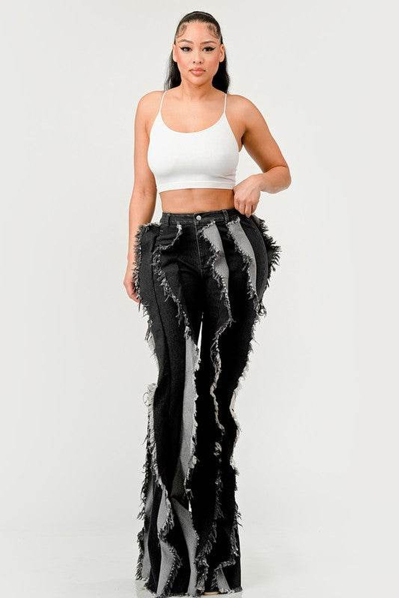 The "Deconstructed Glam" Flared Jeans
Rebel Ruffle Flare Denim