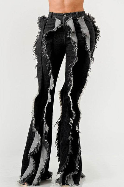 The "Deconstructed Glam" Flared Jeans
Rebel Ruffle Flare Denim