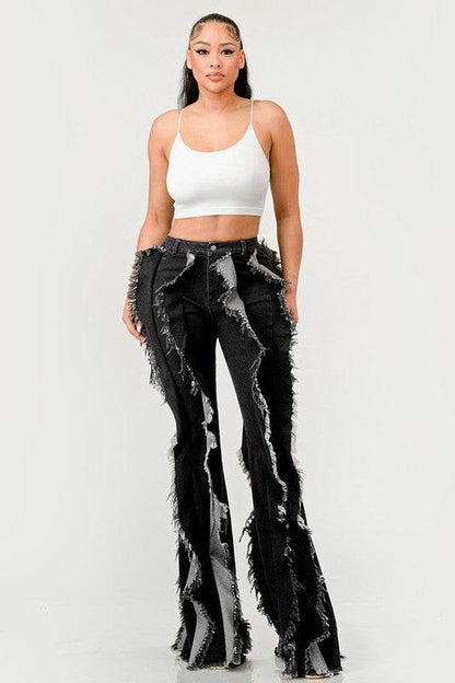 The "Deconstructed Glam" Flared Jeans
Rebel Ruffle Flare Denim