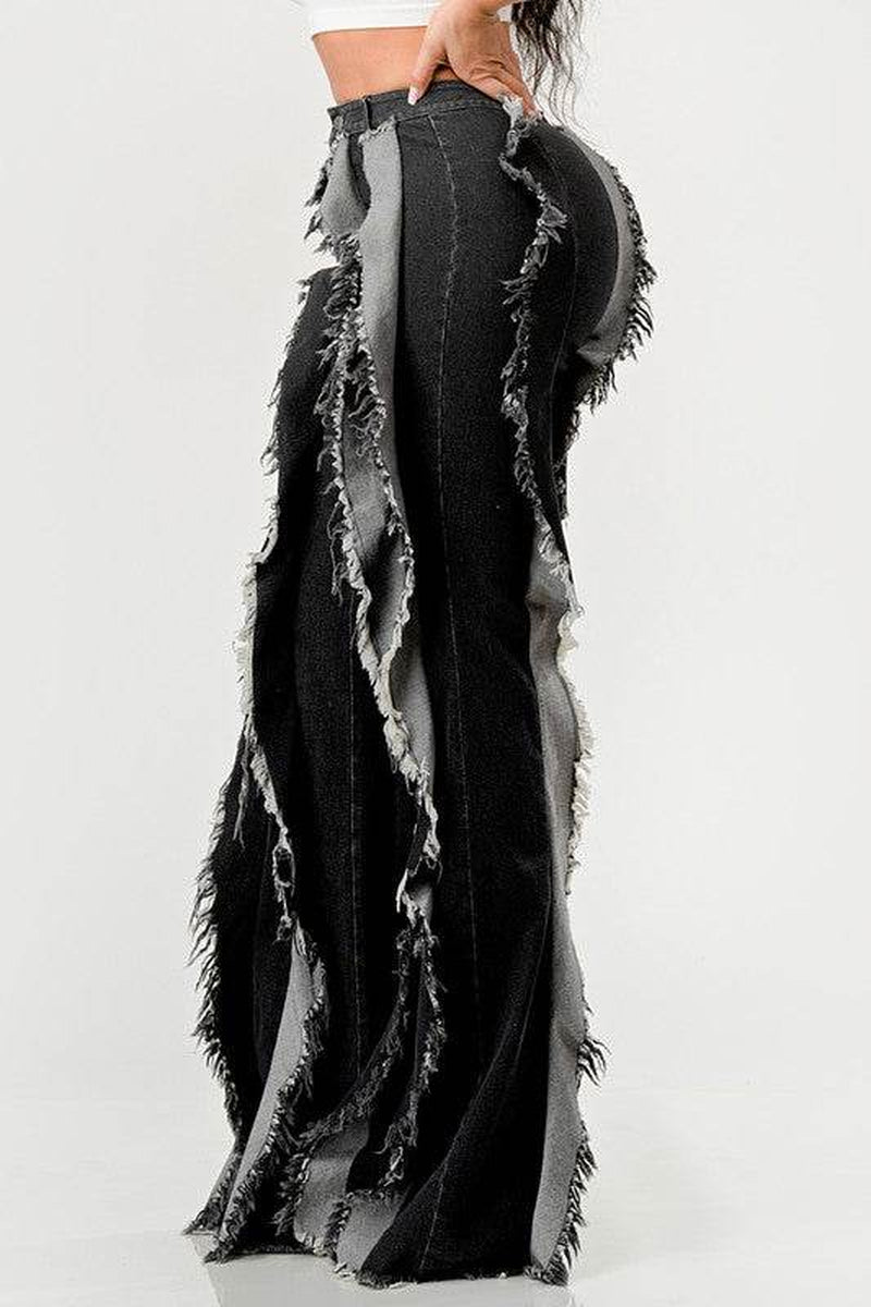 The "Deconstructed Glam" Flared Jeans
Rebel Ruffle Flare Denim